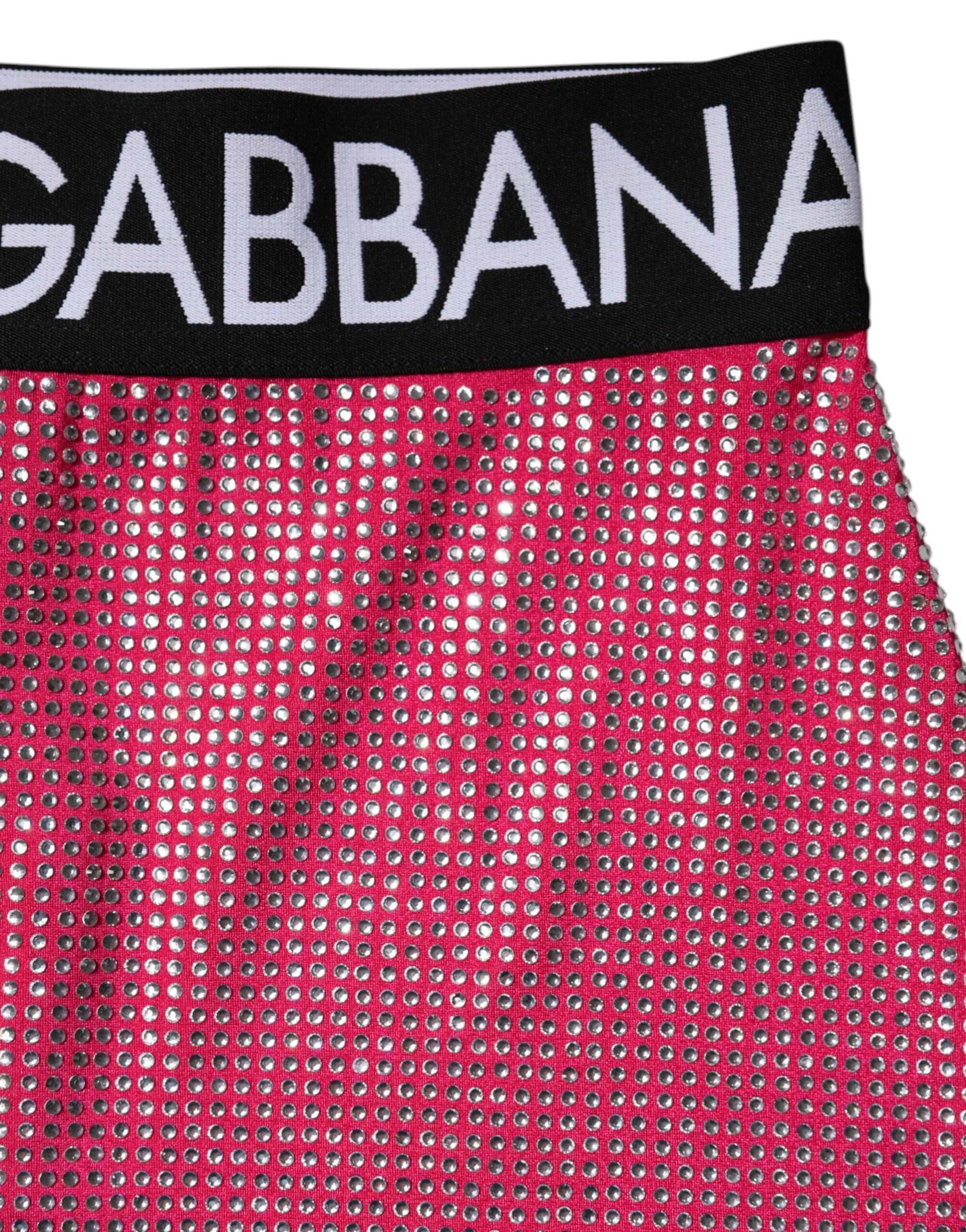 Minifalda Dolce & Gabbana rosa con logo adornado con pedrería