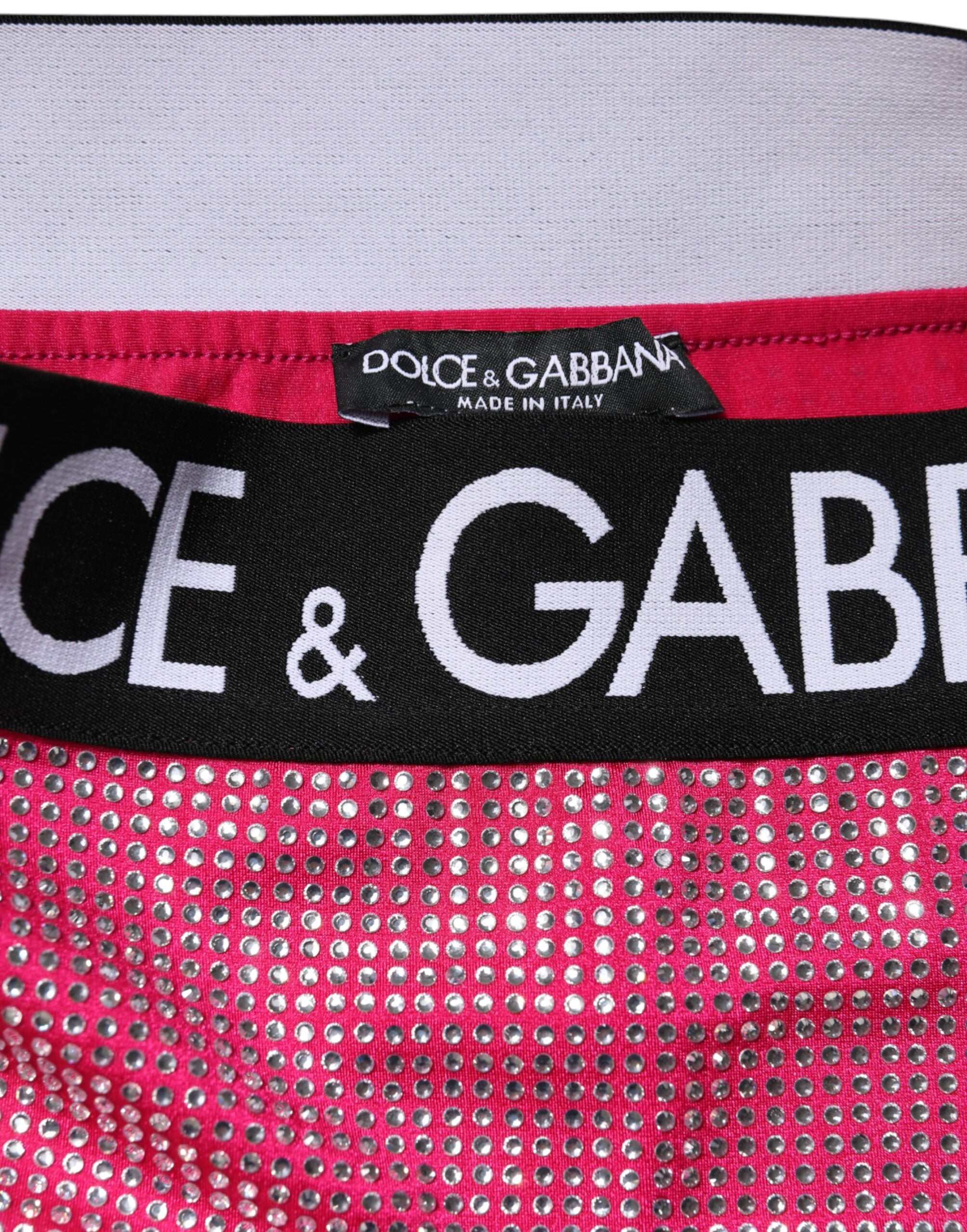 Minifalda Dolce & Gabbana rosa con logo adornado con pedrería