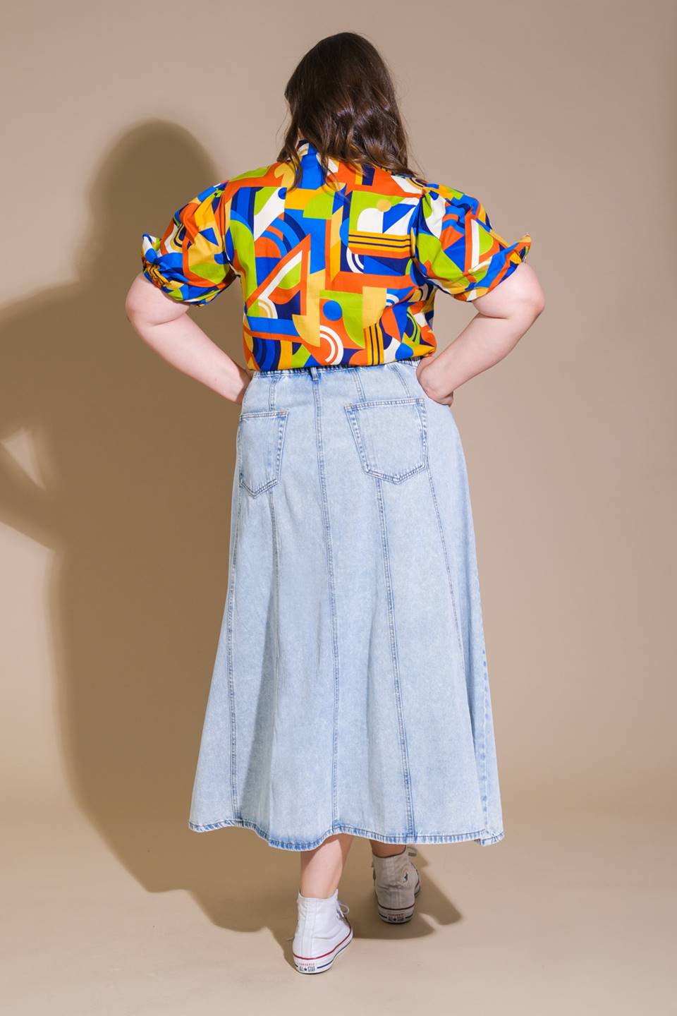 SAIA MIDI JEANS ESTILO COWBOY URBANA