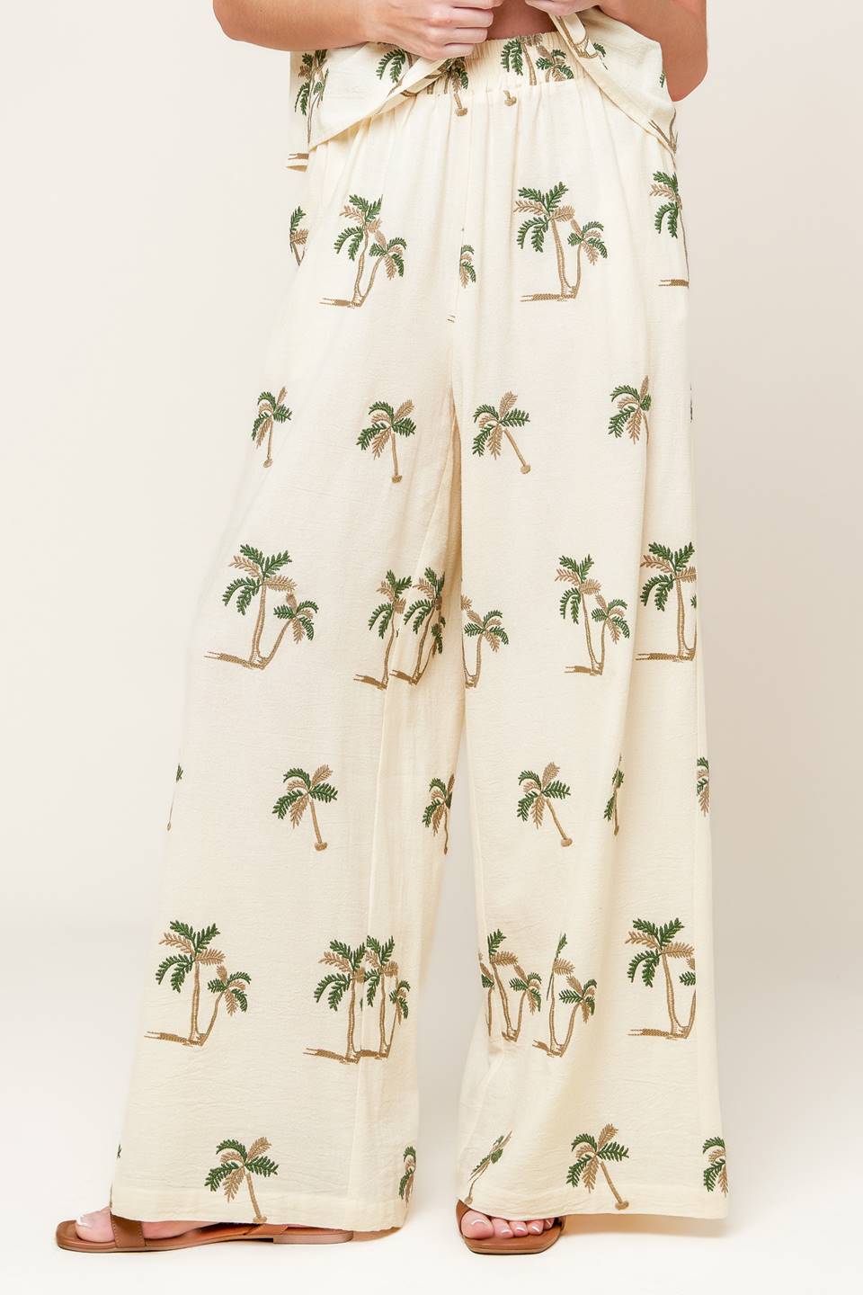 Conjunto de blusa e calça em tecido marfim TERRIFIC TIMING