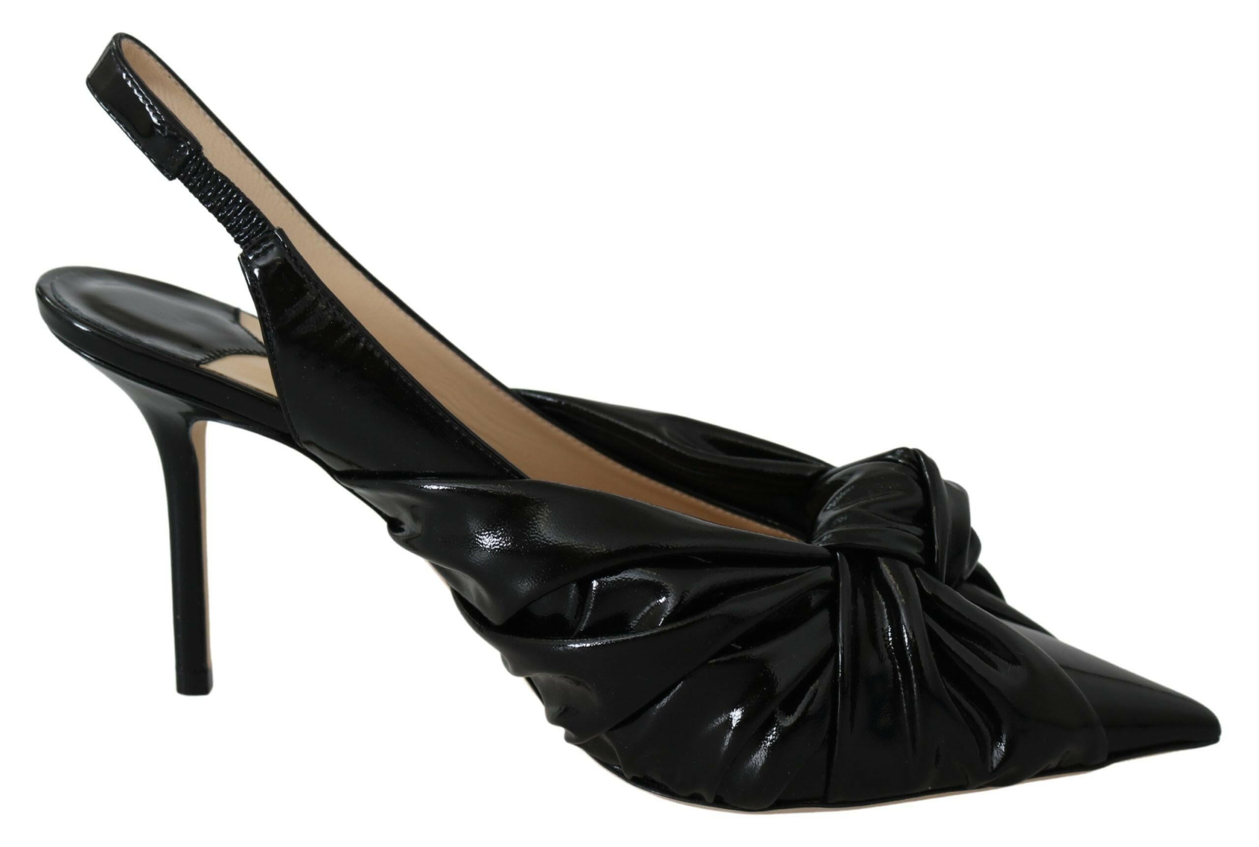 Jimmy Choo Elegant Black Leather Pointed Toe Pumps.