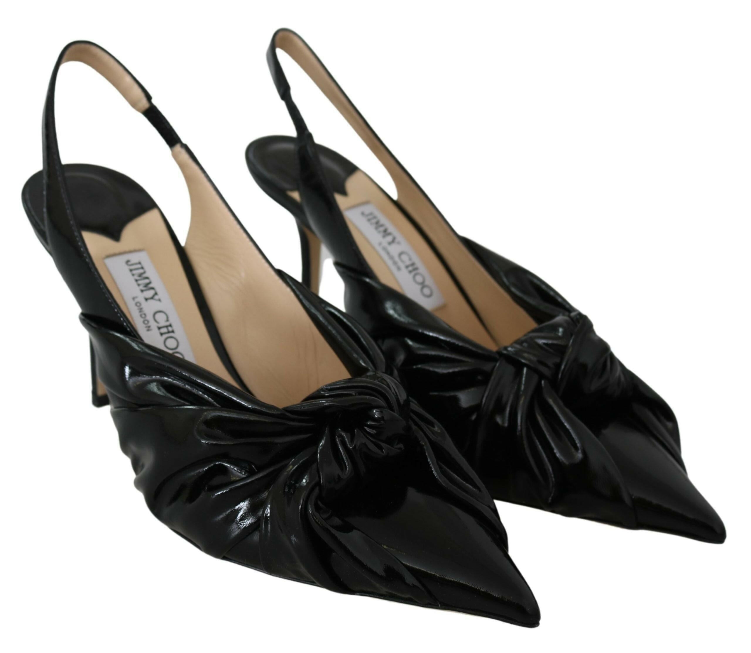Jimmy Choo Elegant Black Leather Pointed Toe Pumps.