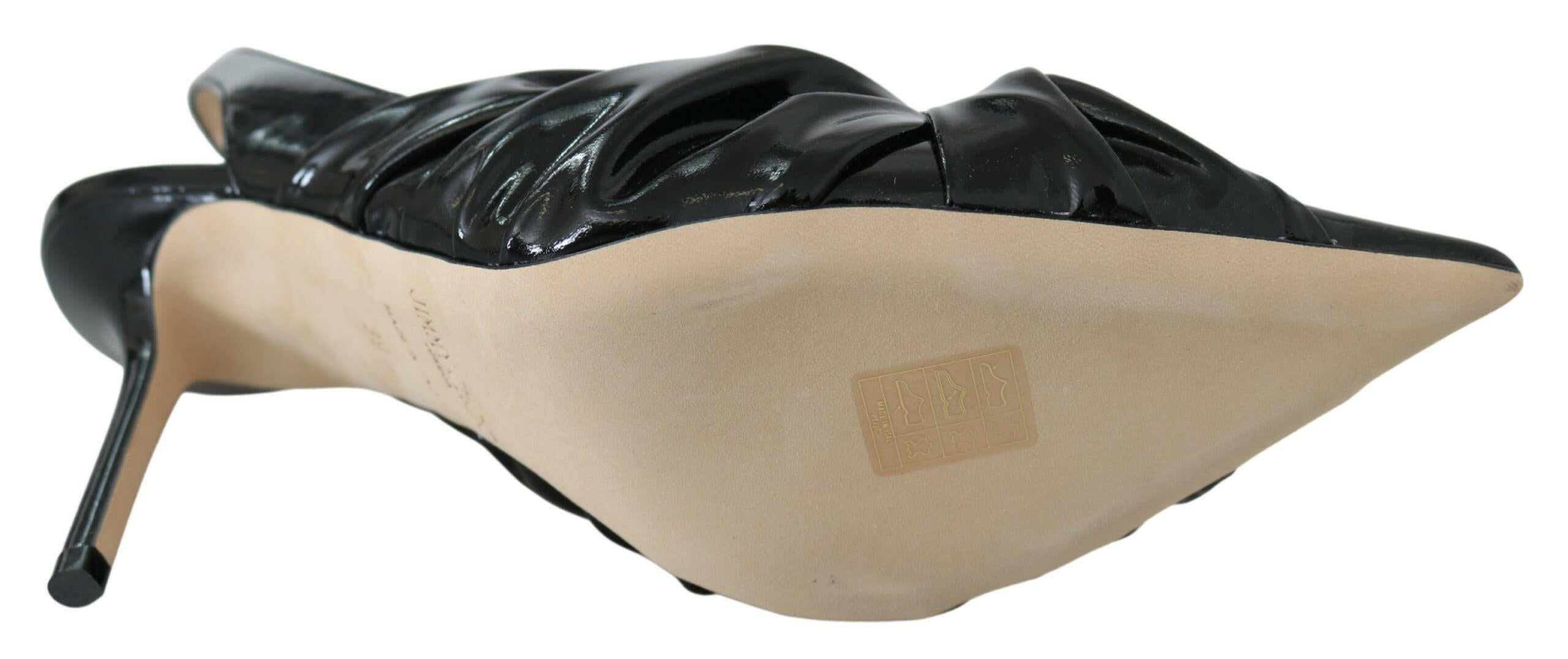 Jimmy Choo Elegant Black Leather Pointed Toe Pumps.