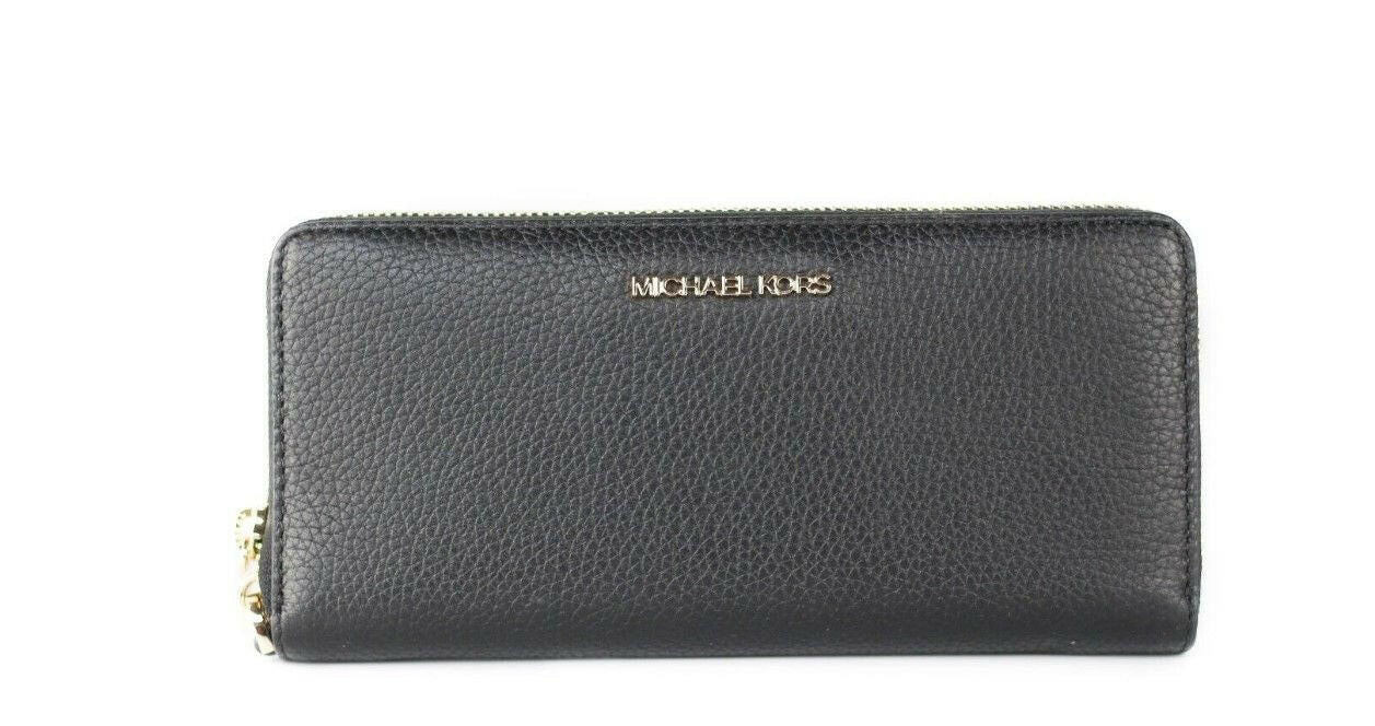 Michael Kors Jet Set Travel Large Black Pebble Leather Continental Wrist Wallet.