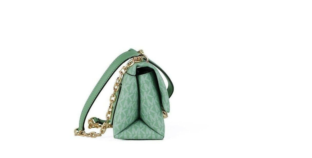 Michael Kors Cece Small Sea Green Signature PVC Convertible Flap Crossbody Bag.