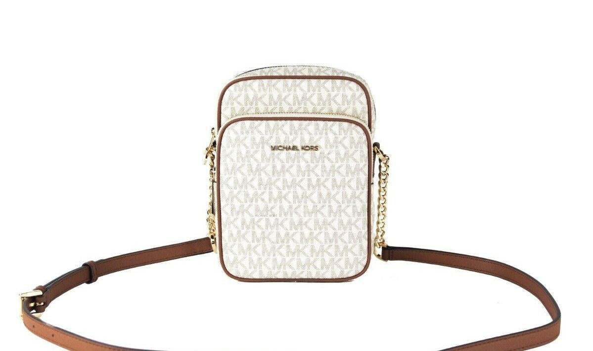 Michael Kors Jet Set Medium Vanilla PVC North South Chain Crossbody Handbag.