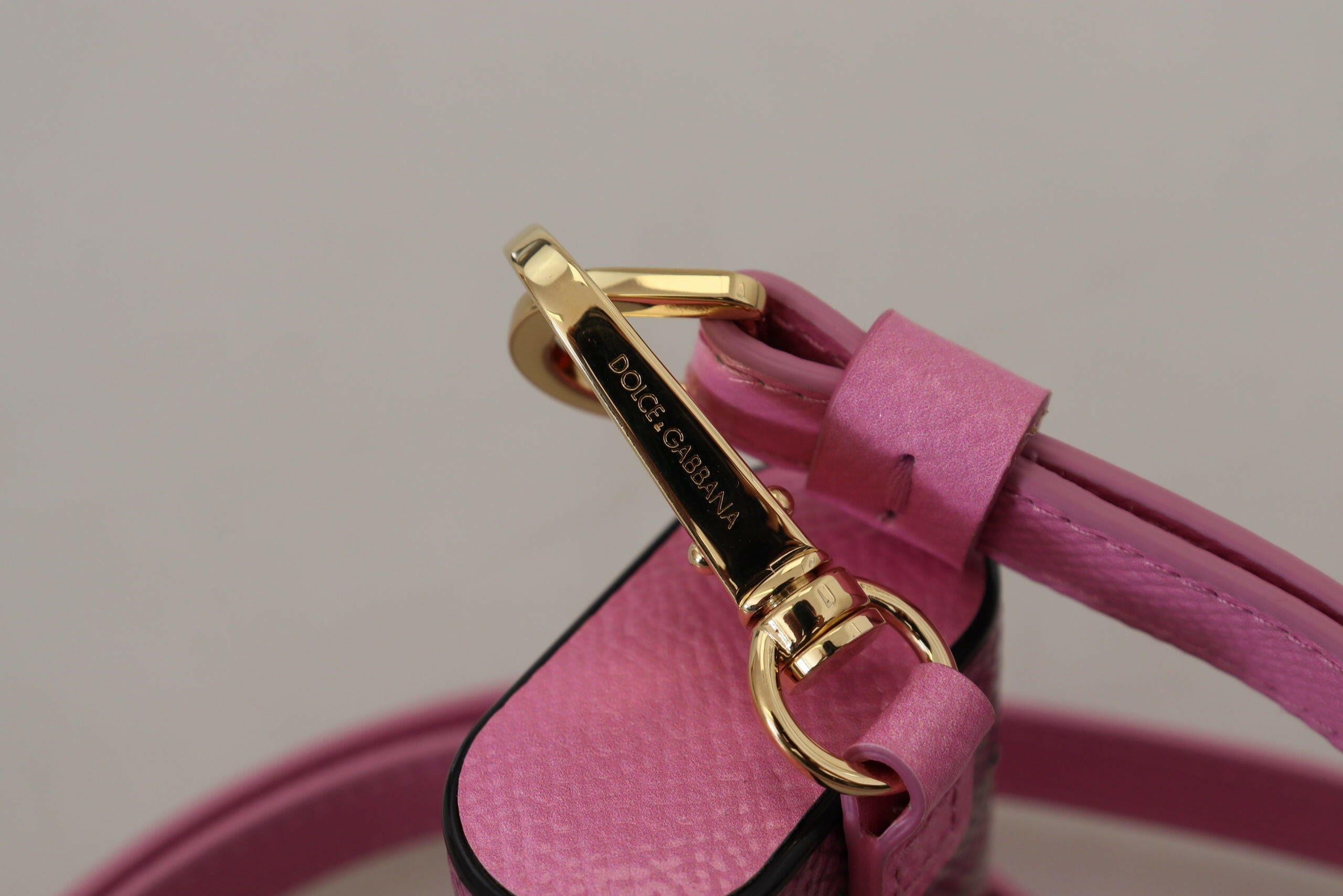 Dolce & Gabbana Pink Black Leather Strap Gold Metal Logo Airpods Case.