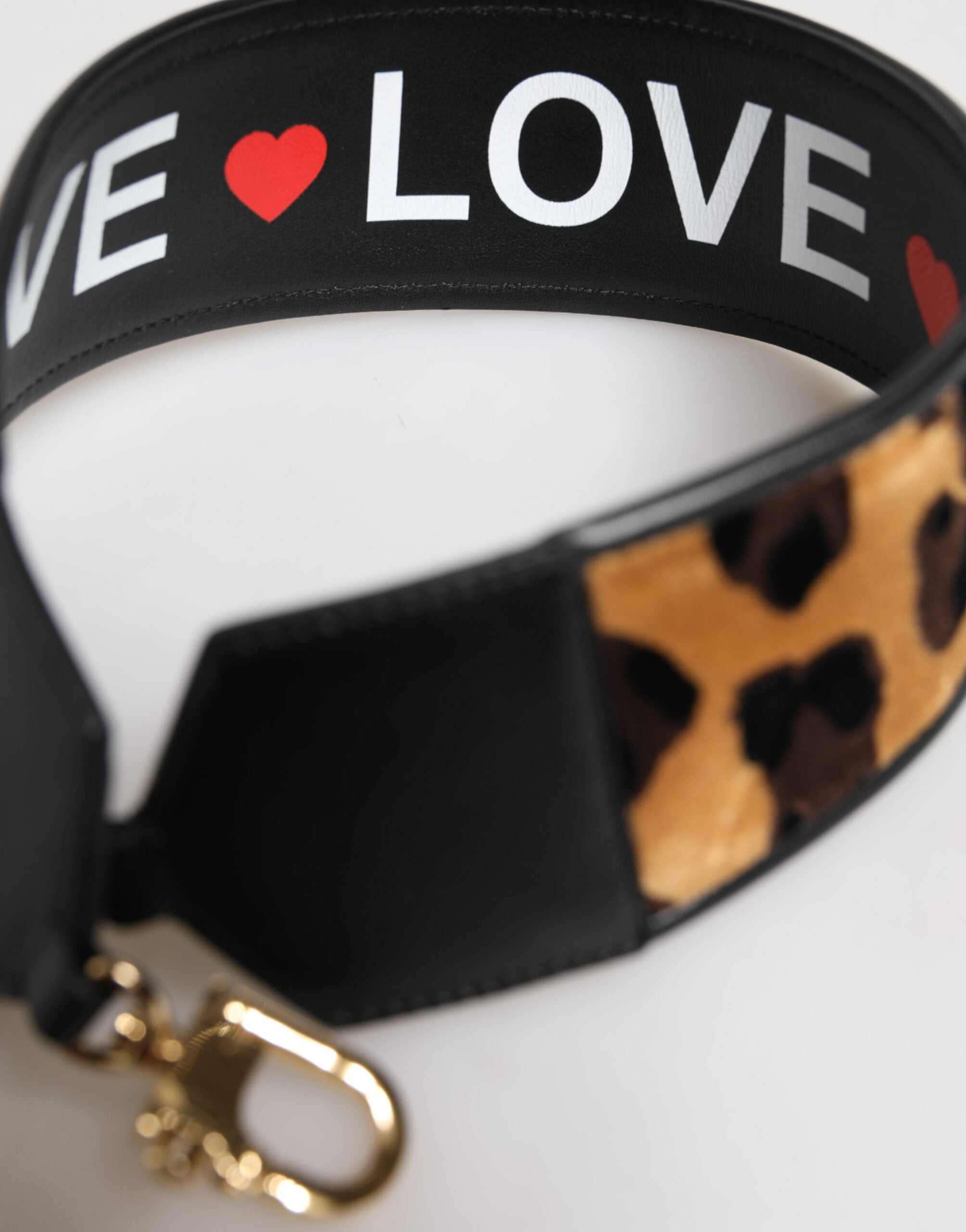 Bolsa Dolce &amp; Gabbana preta com estampa de leopardo e alça de ombro reversível.