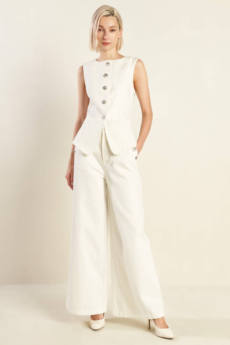 COLETE TECIDO EM TOM DELICADO