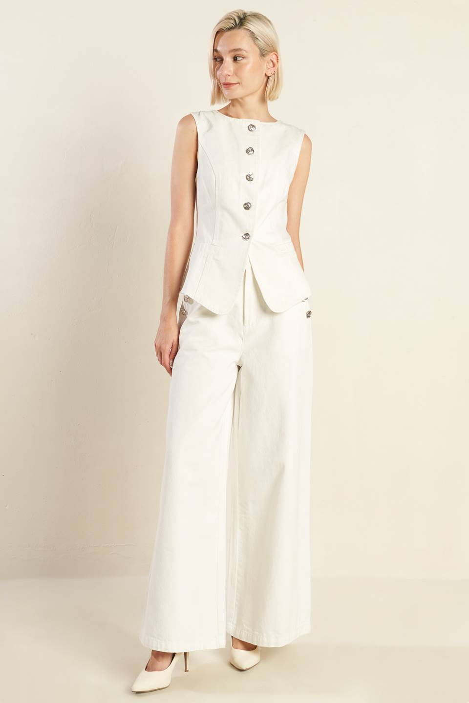 COLETE TECIDO EM TOM DELICADO