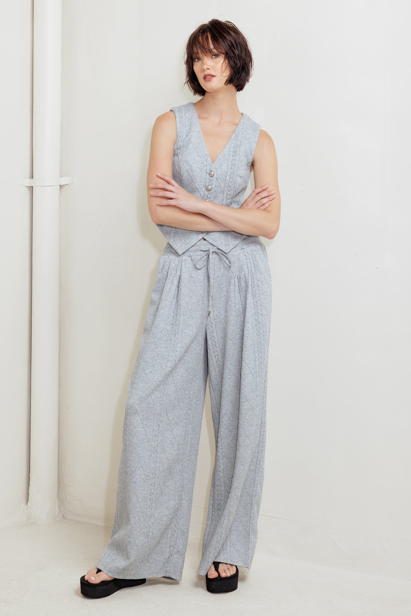 CHALECO DE PUNTO CITY RIVETS