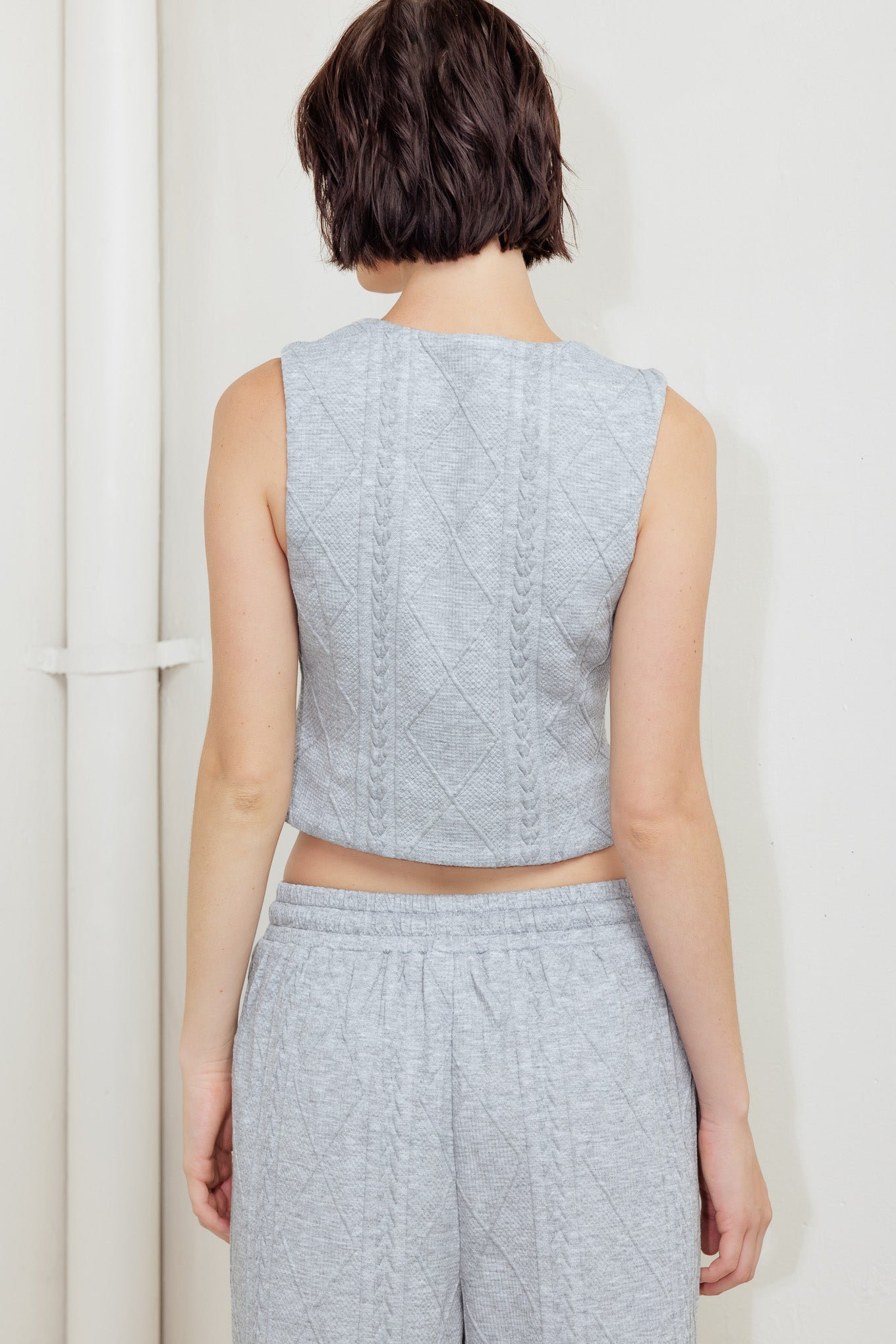 CHALECO DE PUNTO CITY RIVETS