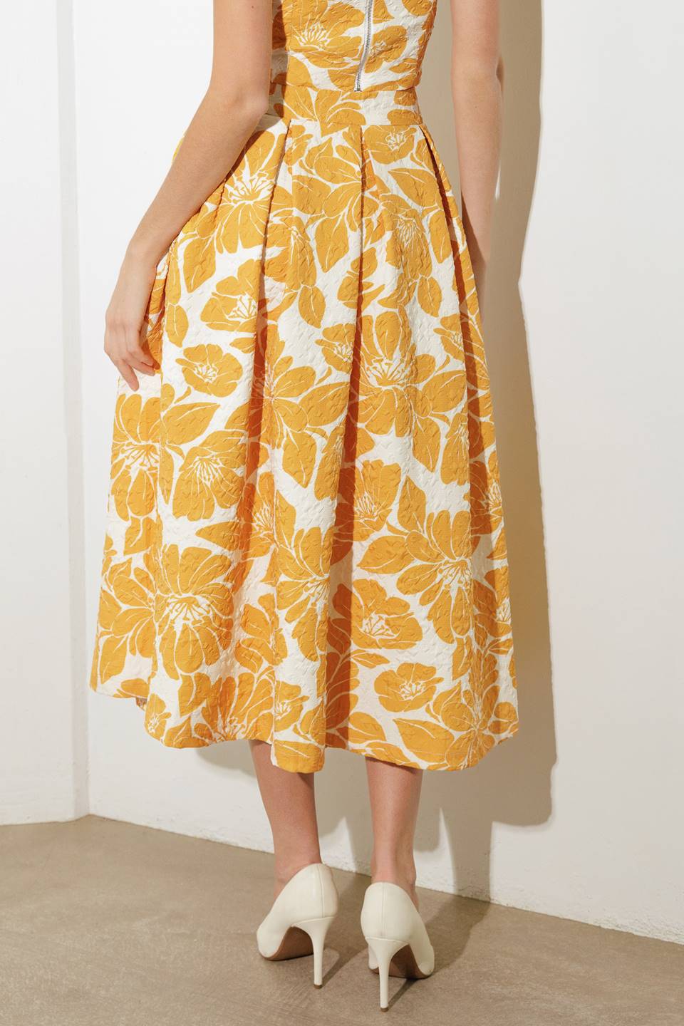 FALDA MIDI TEJIDA DE OPTIMISMO LISO