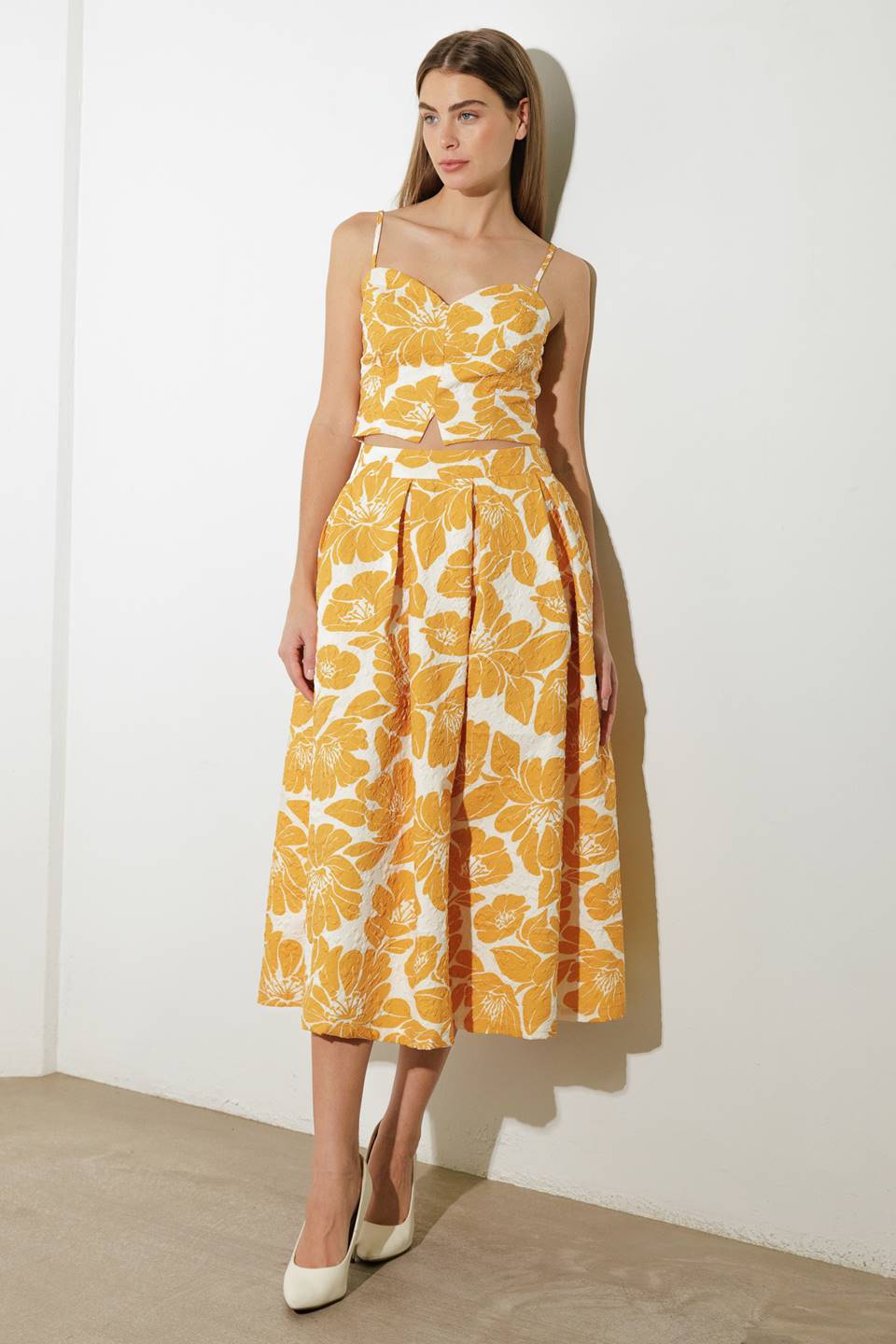 FALDA MIDI TEJIDA DE OPTIMISMO LISO