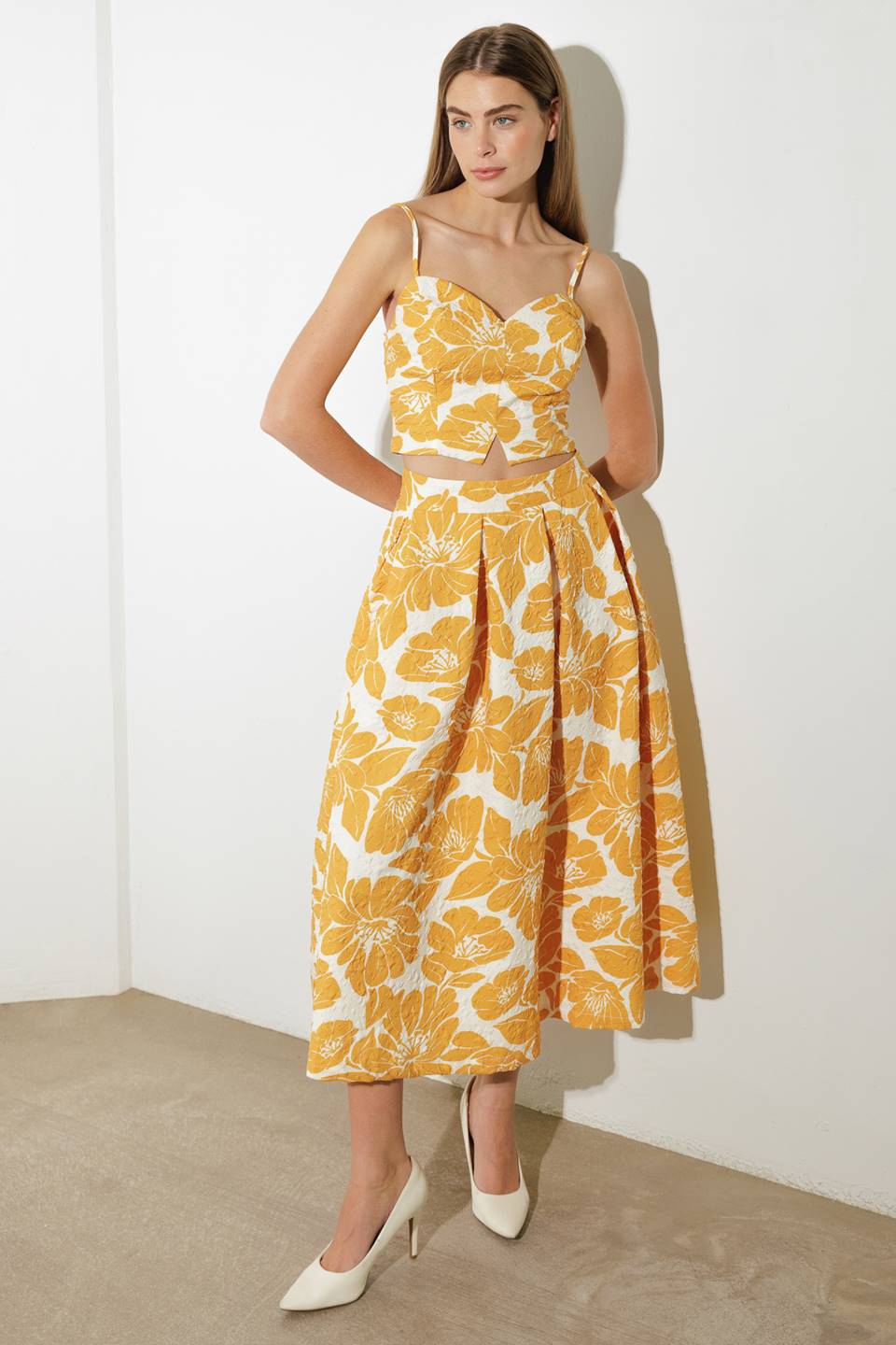 FALDA MIDI TEJIDA DE OPTIMISMO LISO