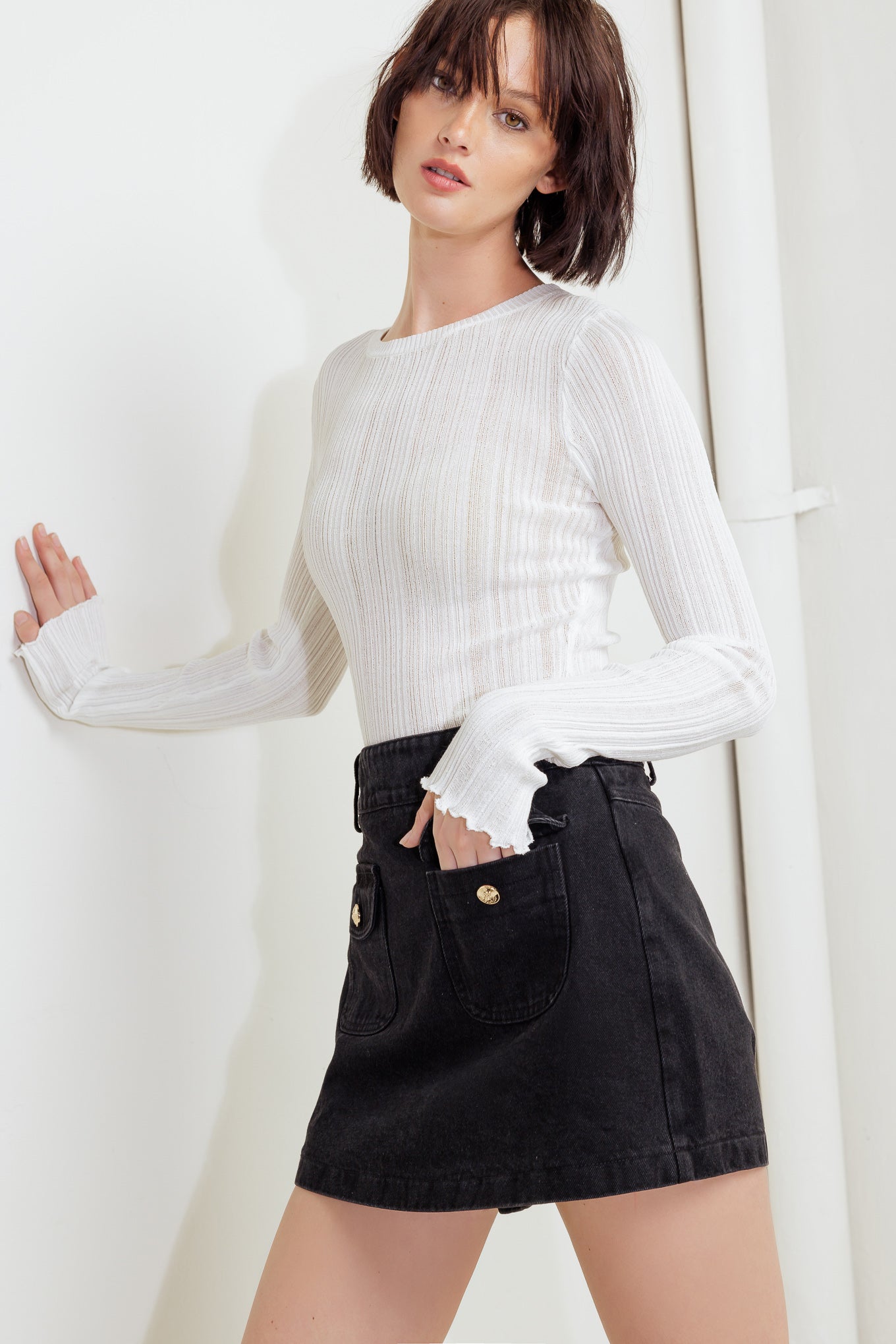 Falda pantalón negra tejida de corte fluido a medida