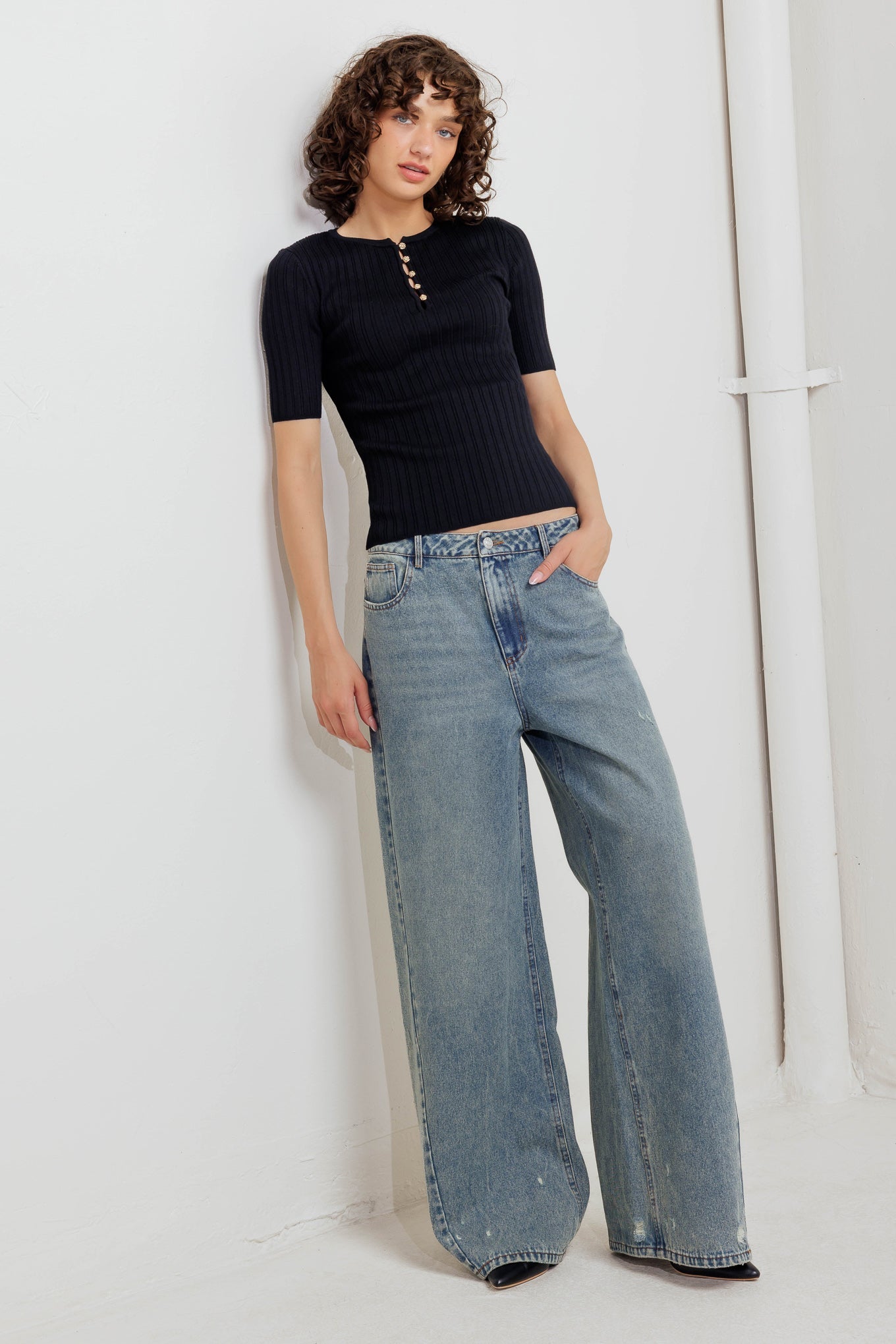 BLUSA DE TRICÔ MODERNA COM CACHOS