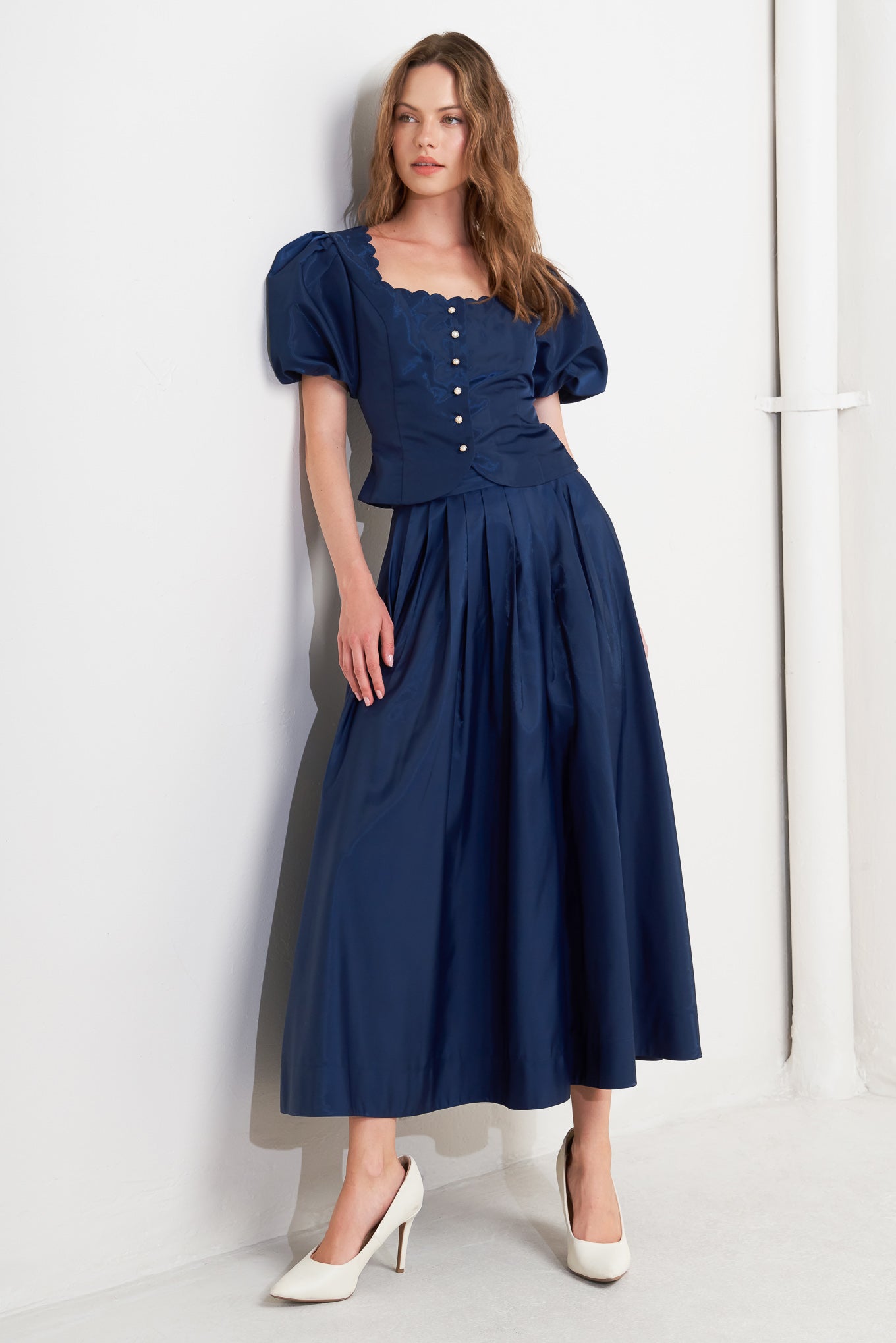 TOP TEJIDO CON BESO DE VIENTO