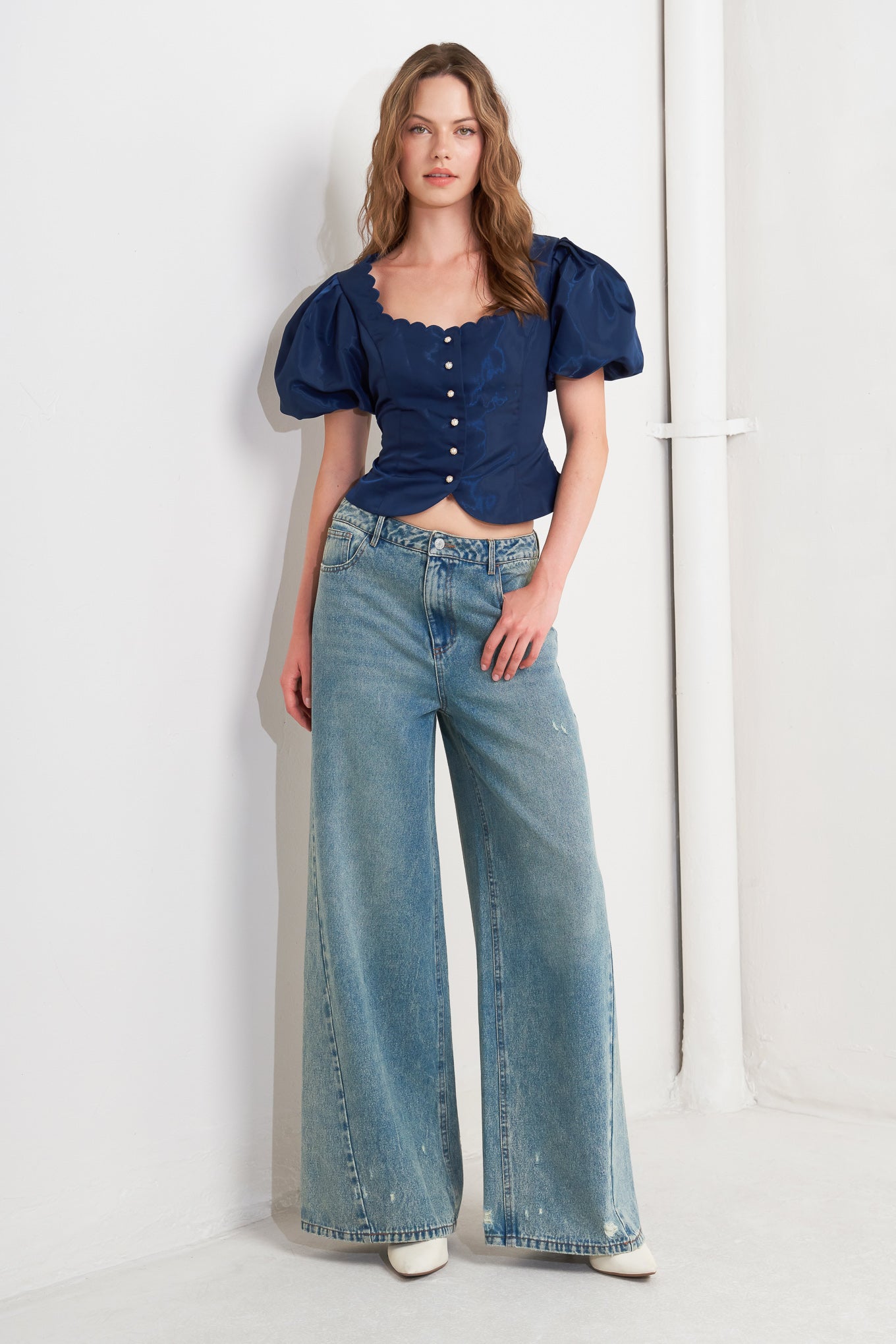 TOP TEJIDO CON BESO DE VIENTO