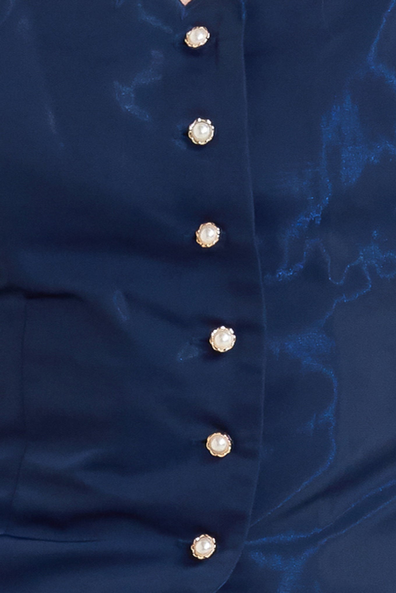 TOP TEJIDO CON BESO DE VIENTO