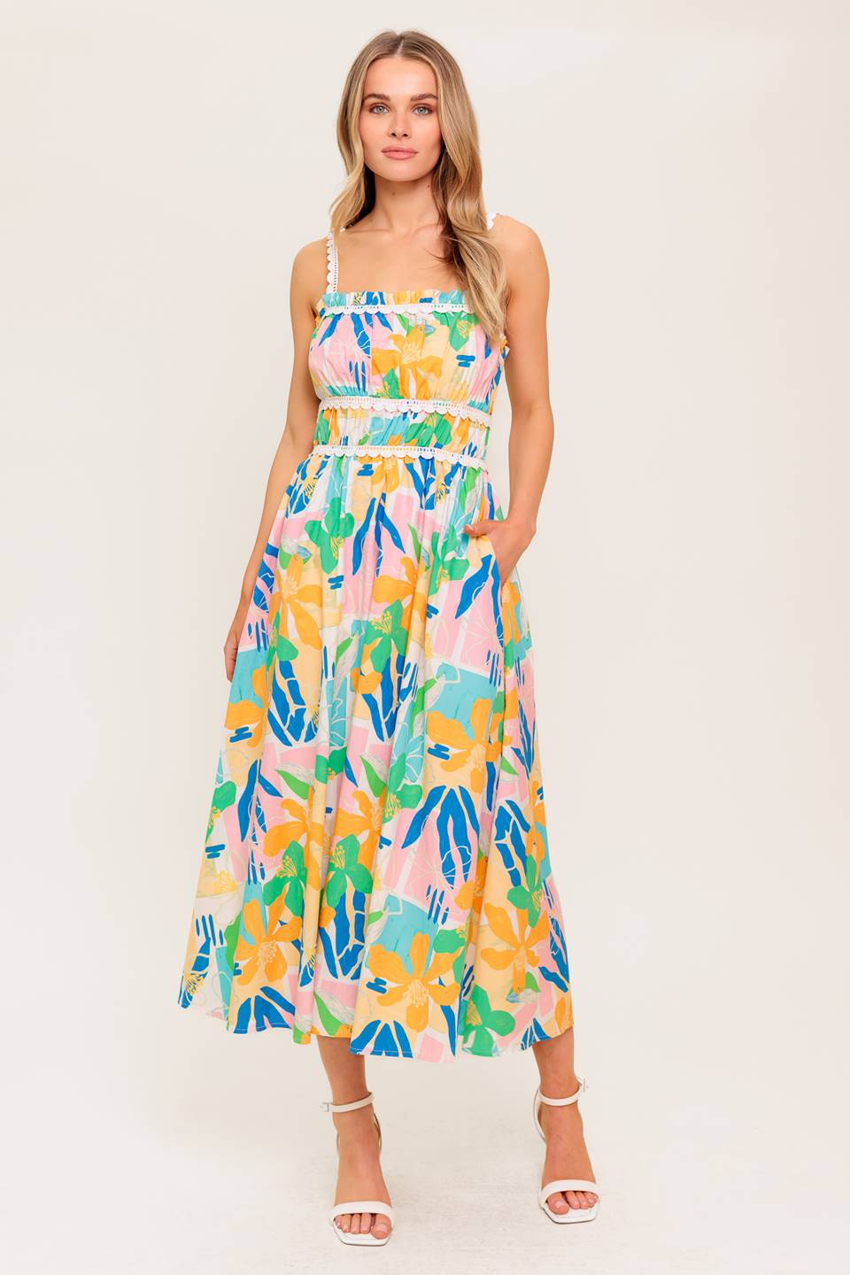 VESTIDO MIDI TEJIDO ROSA AZUL DE JARDÍN ILUMINADO POR EL SOL