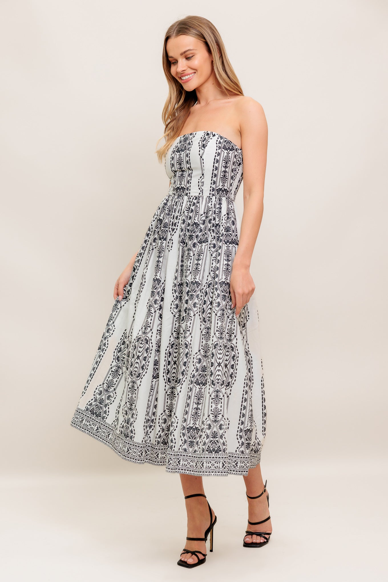 VESTIDO MIDI DE PUNTO DE SILUETA ​​DE VERANO