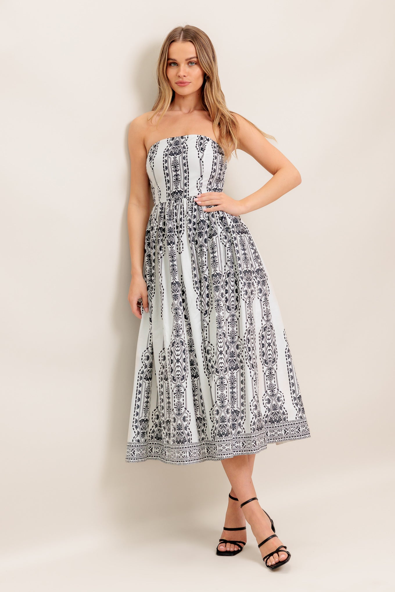 VESTIDO MIDI DE PUNTO DE SILUETA ​​DE VERANO