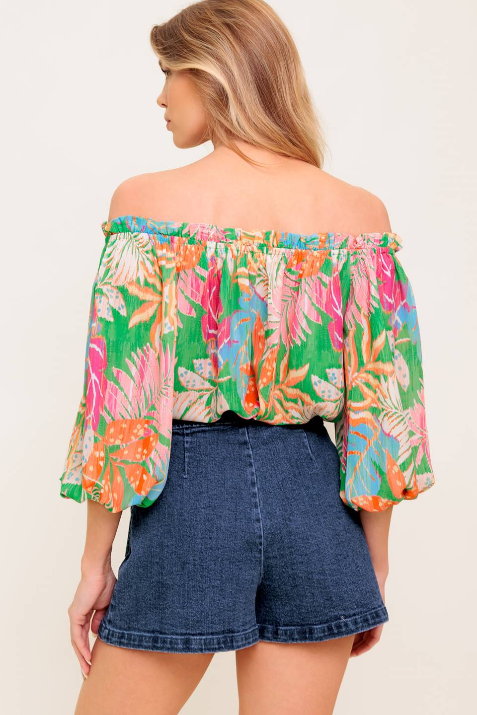 Top tejido verde con la frase "Voto de amor"