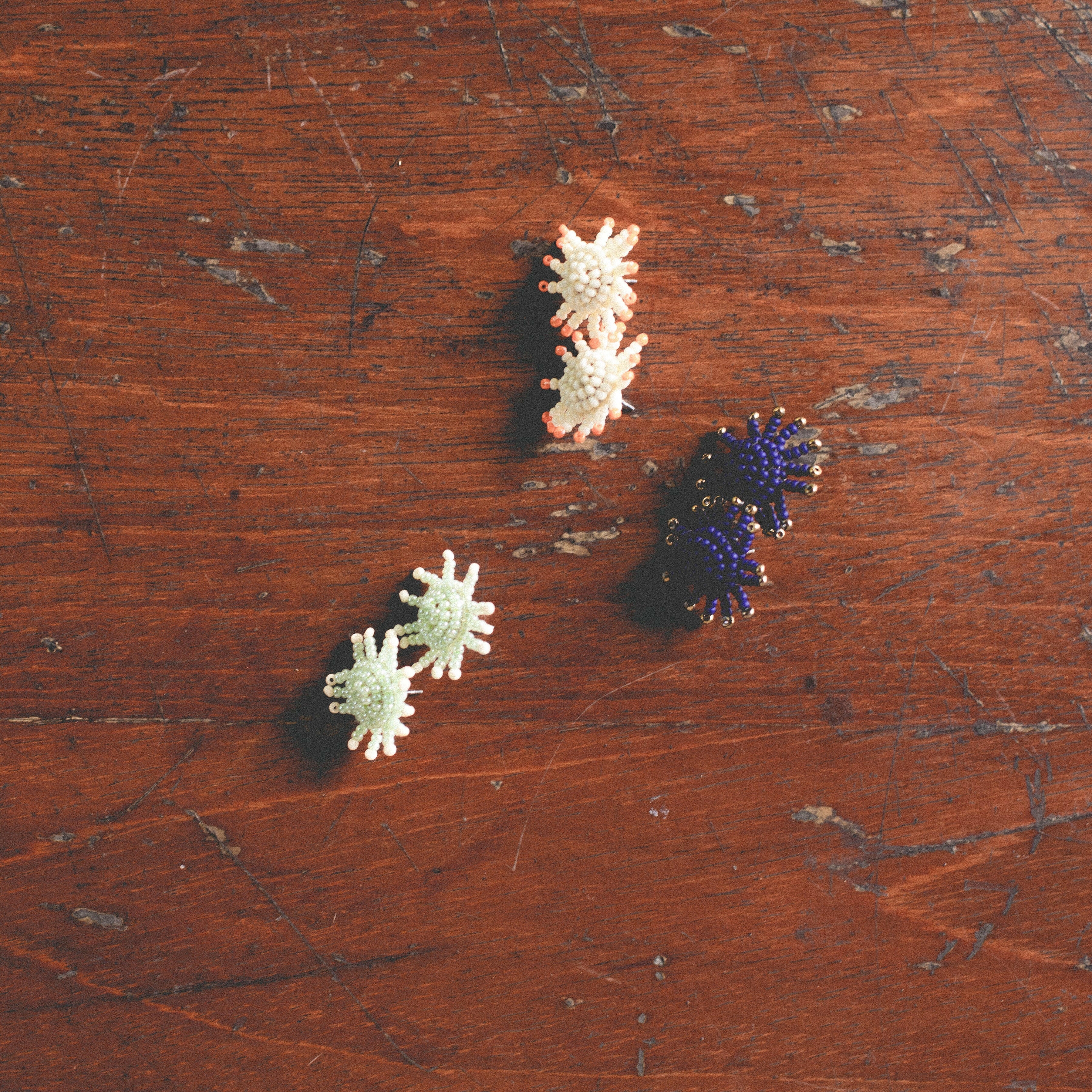 Beaded Sunburst Earring.
