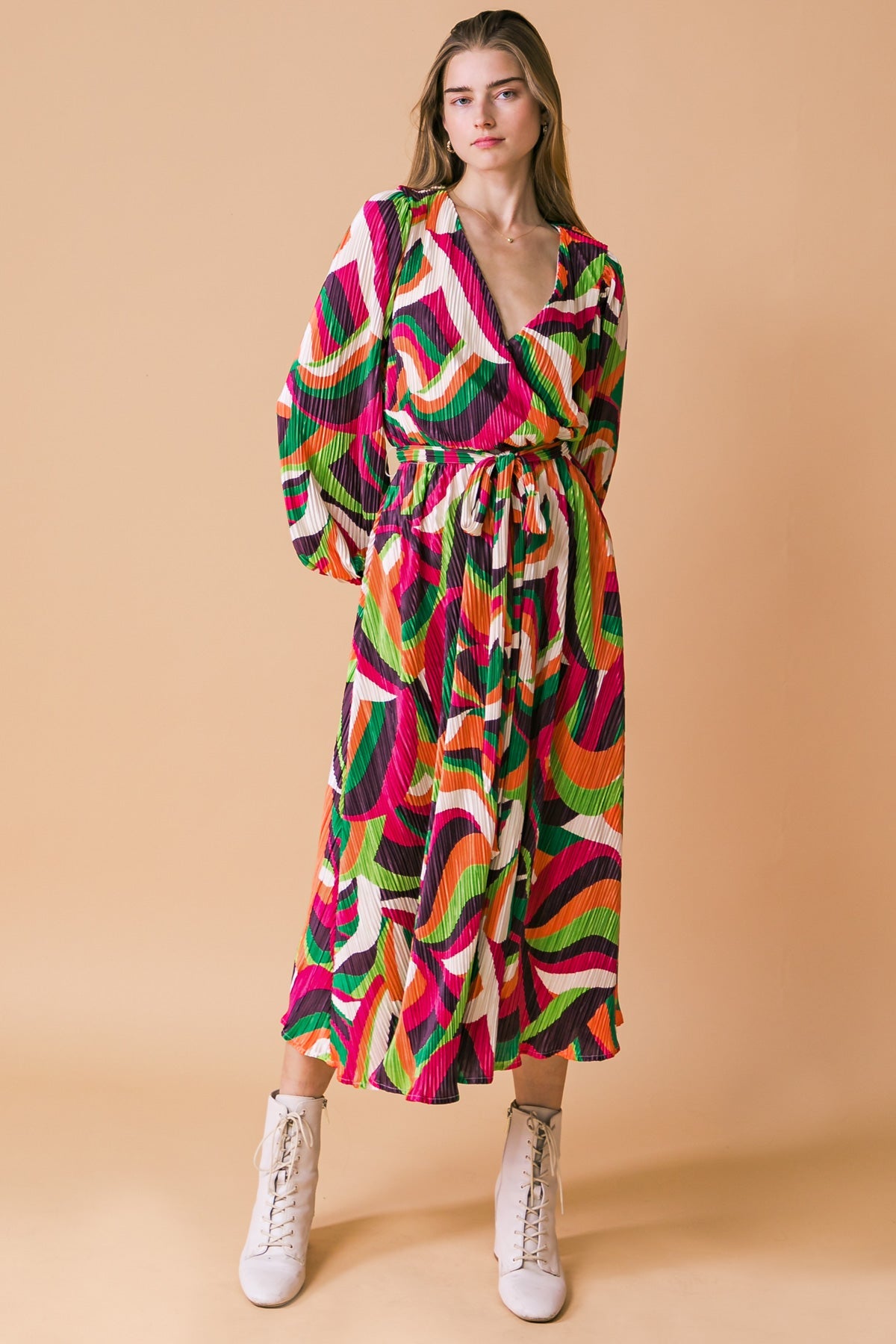 VESTIDO MIDI PLISADO DESTINADO A IMPRESIONAR