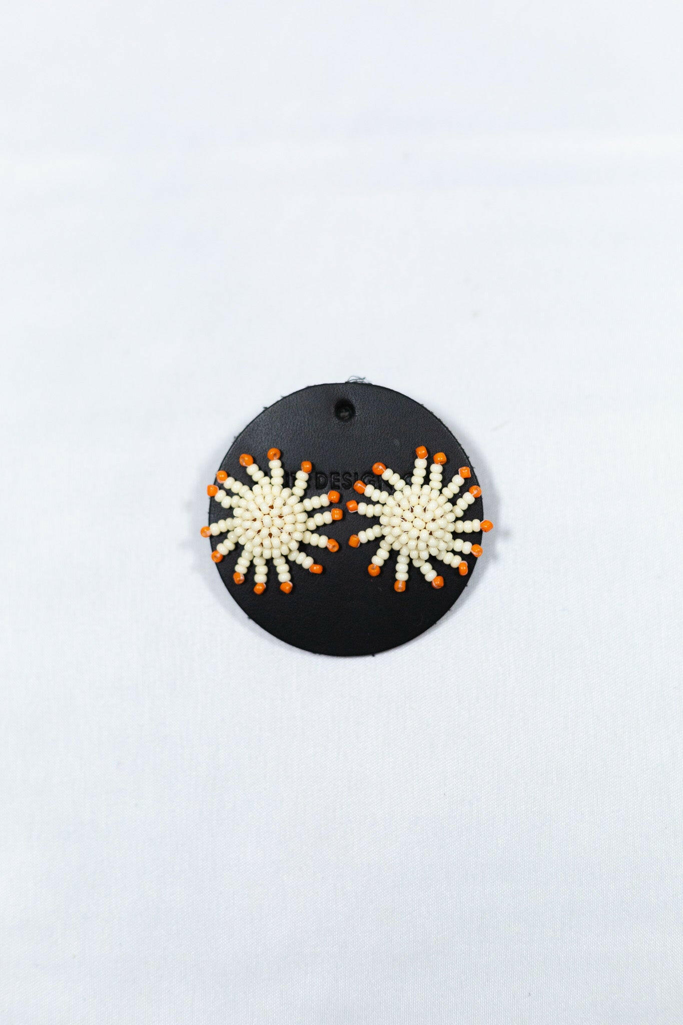 Beaded Sunburst Earring.
